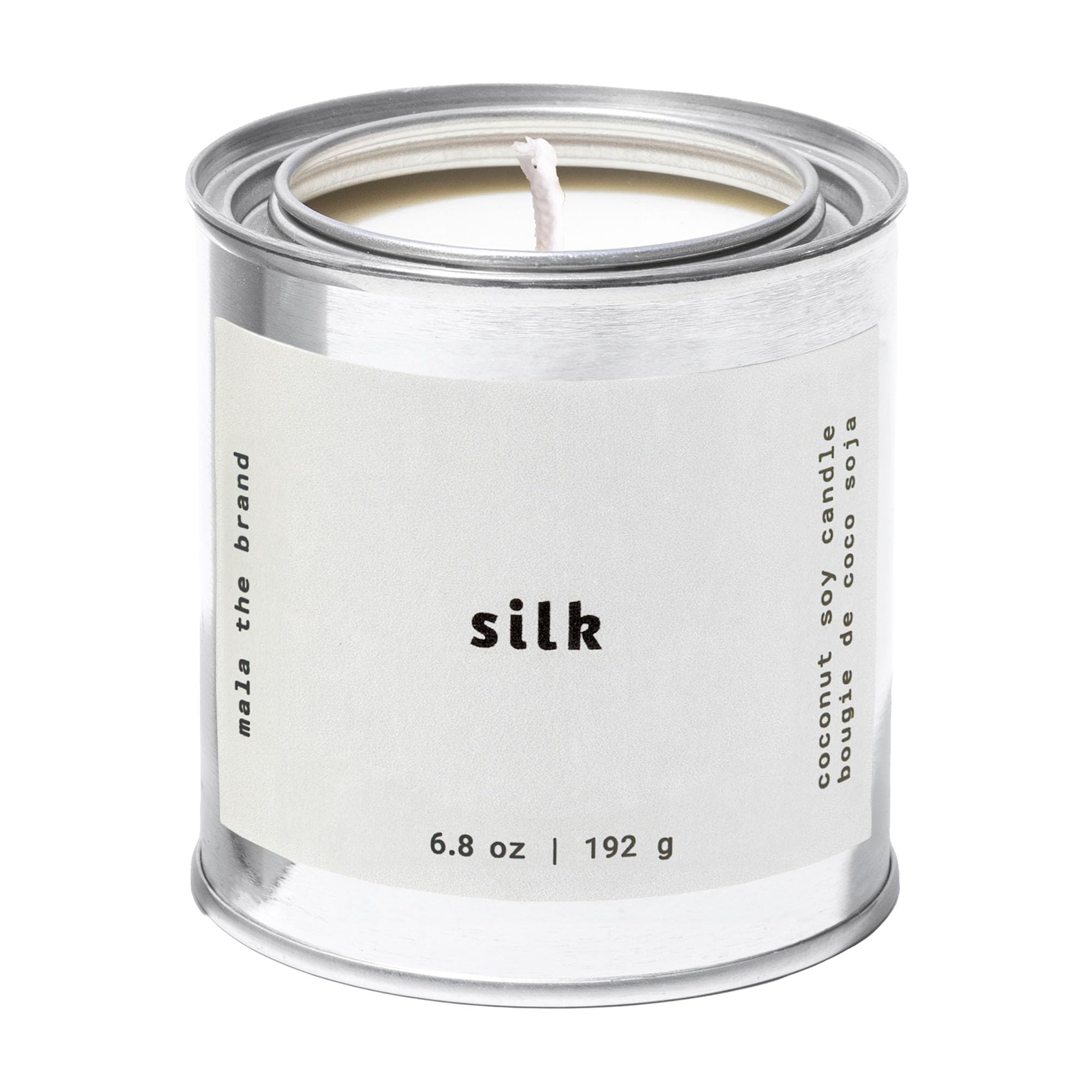 MALA tonka bean jasmine coconut candle lit creates warm inviting atmosphere