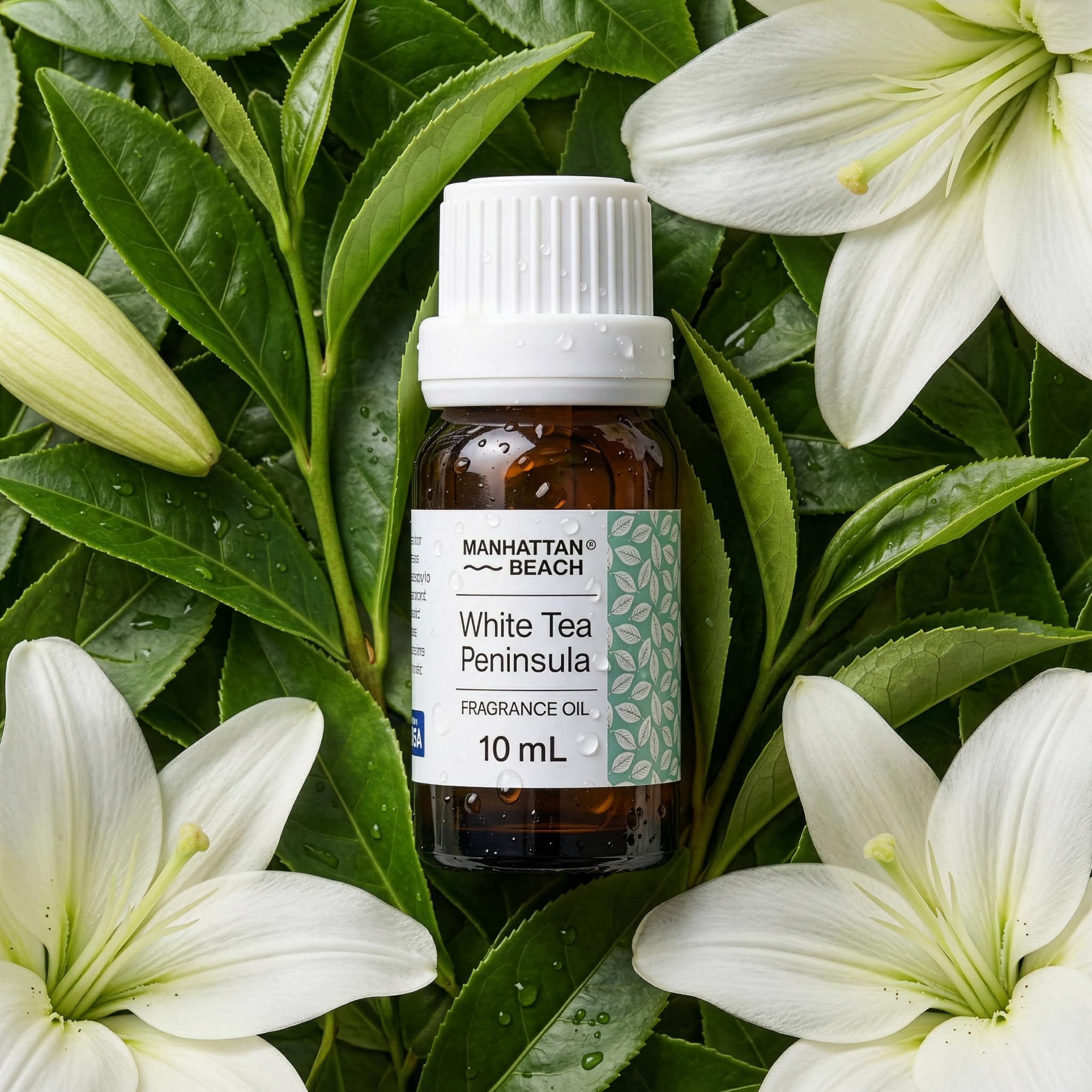 Manhattan Beach White Tea Peninsula amber glass bottle highlights premium packaging.
