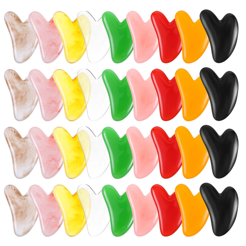 Maquita heart-shaped gua sha in yellow for facial massage and gentle contouring
