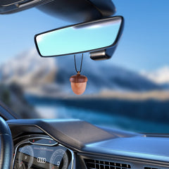 Maromalife acorn diffuser inside car releasing a subtle aroma