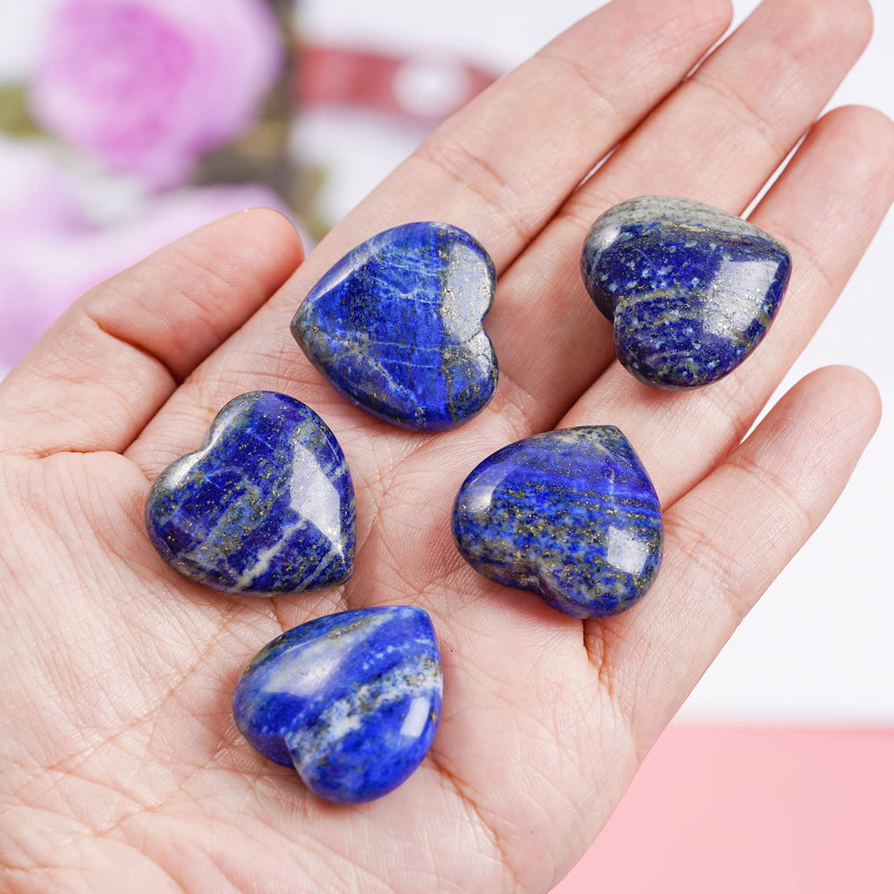 Polished lapis lazuli heart stone by Marrywindix showing the glossy finish