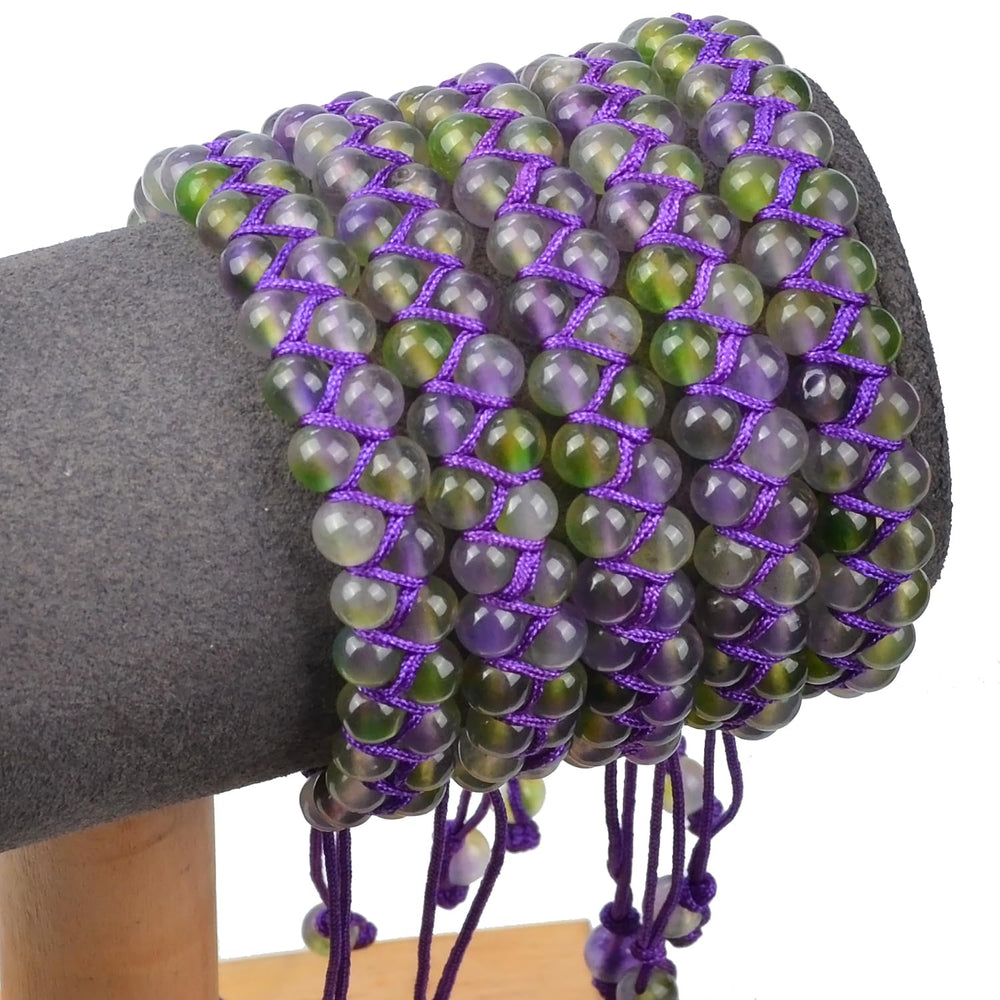 MASSIVE BEADS bracelet on wrist demonstrates the 6.5–10 inch adjustable range for unisex comfort