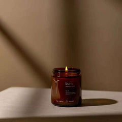 Maude Burn No. 3 melted oil pour shown as soothing massage base with eucalyptus and sandalwood.