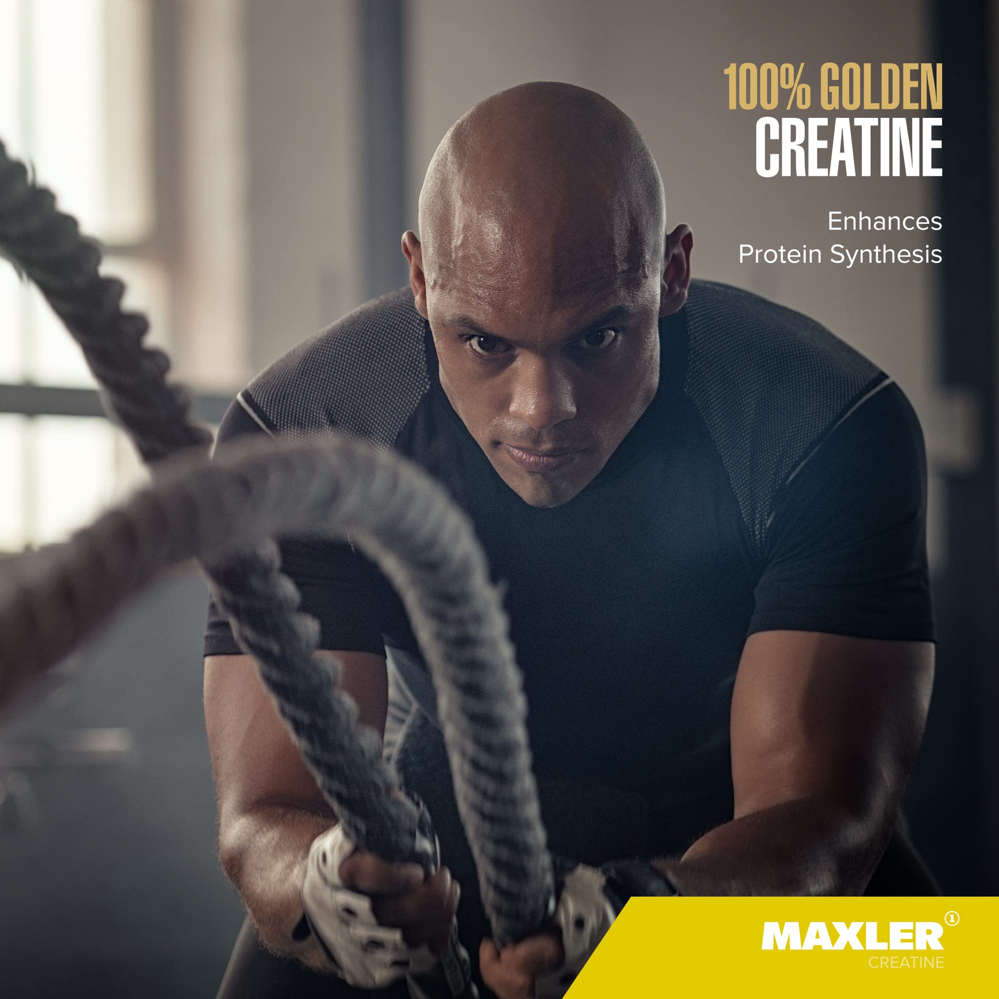 Maxler athlete in gym preparing a post-workout drink with creatine.