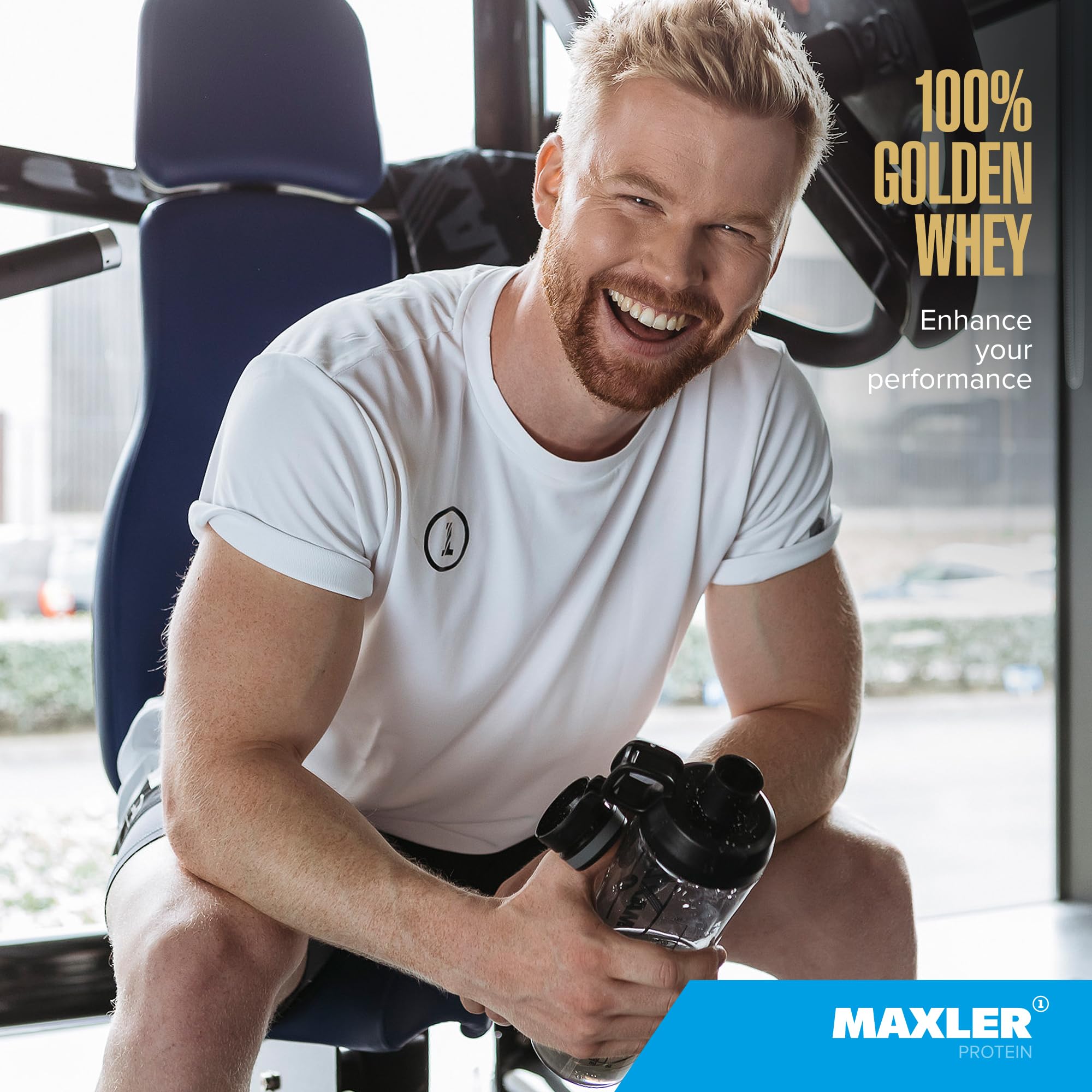 Pouring Golden Whey powder into a shaker after training.