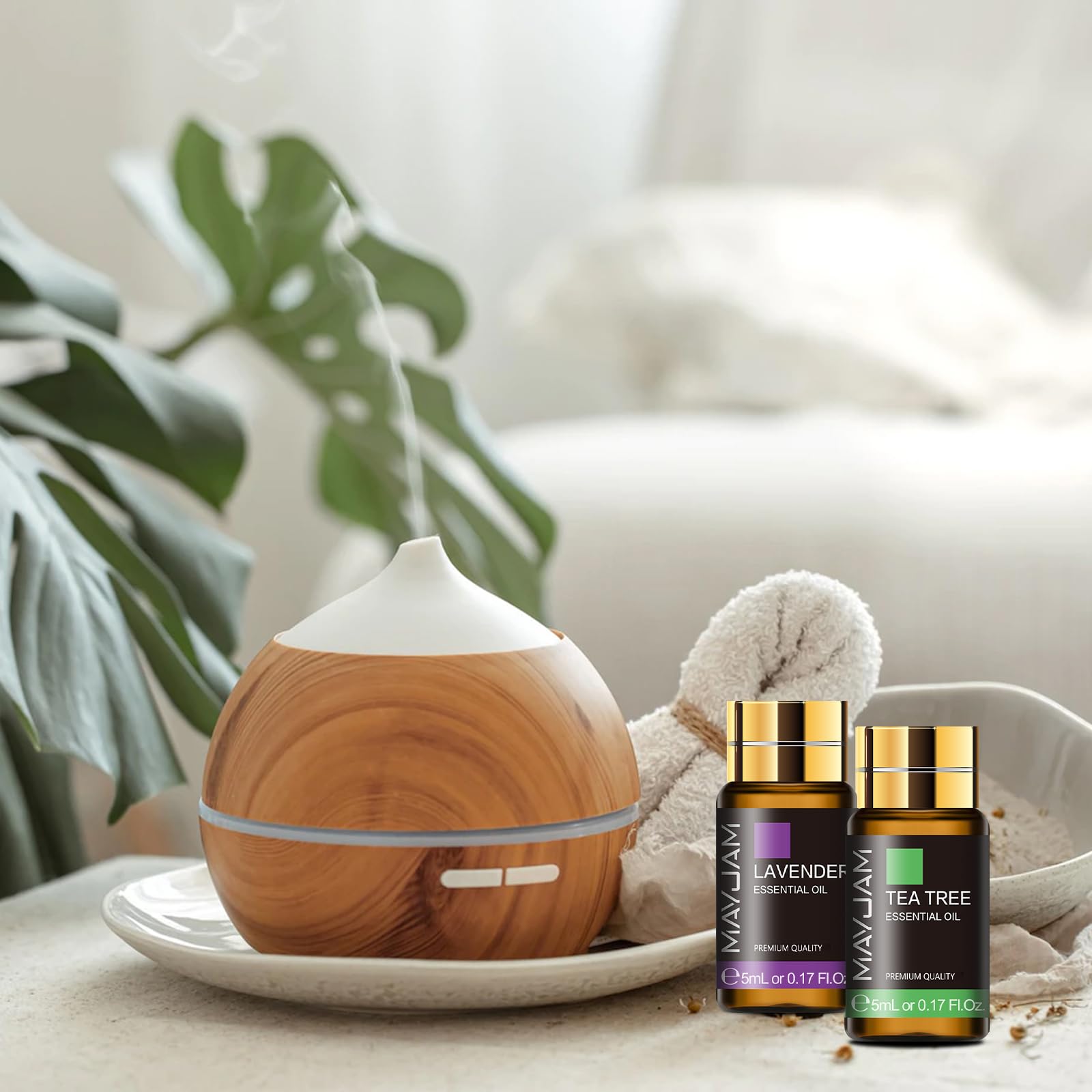 MAYJAM eucalyptus essential oil bottle closeup for refreshing room scent.