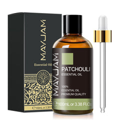 MAYJAM Patchouli essential oil in an amber glass bottle for grounding aroma.