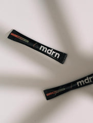MDRN Hydration strawberry kiwi sticks dissolve easily for a refreshing boost.