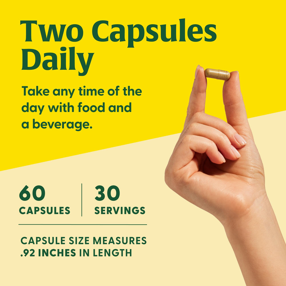 MegaFood Lions Mane capsules close-up, vegan and gluten-free supplement in a 60-count bottle.