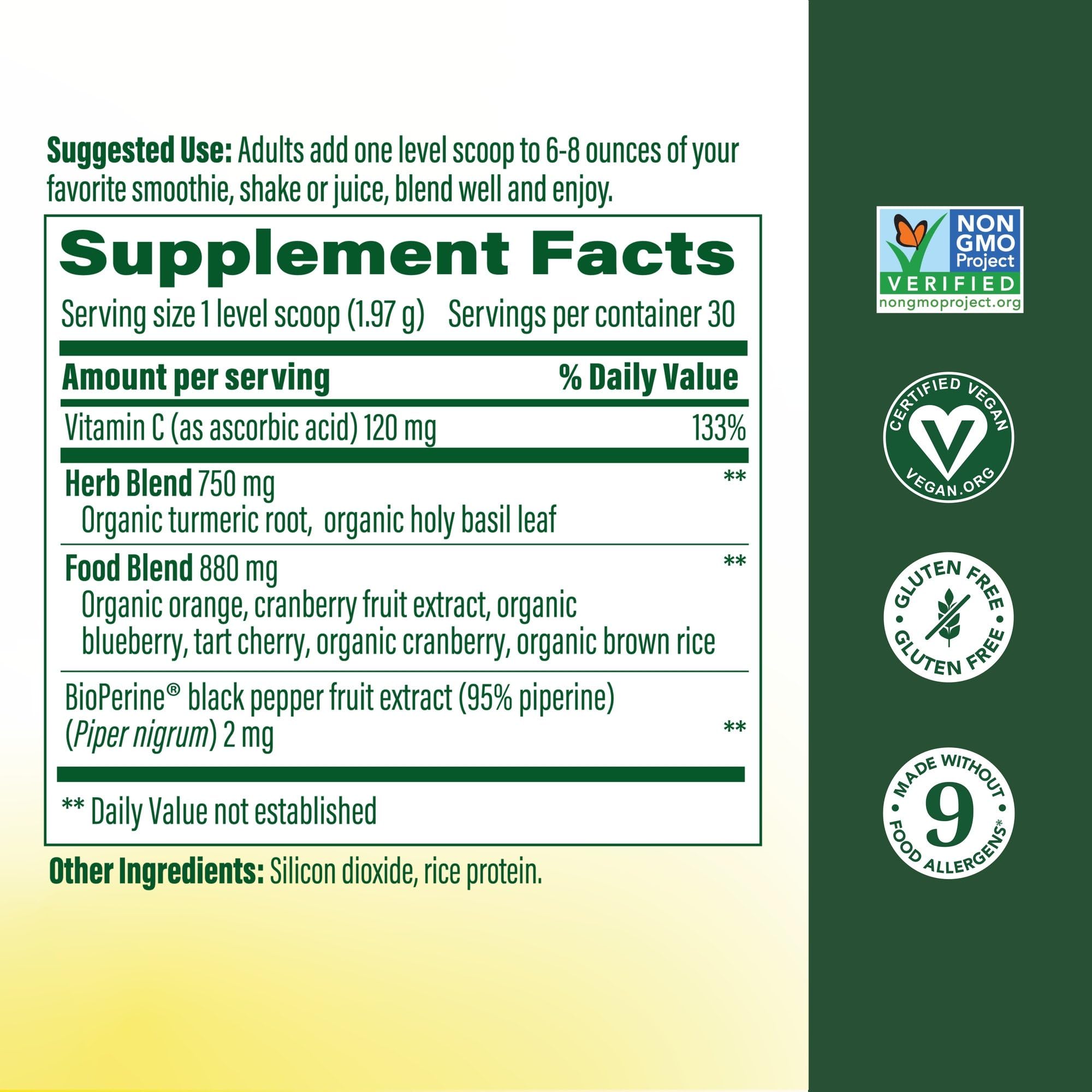 MegaFood Daily Turmeric Powder label close up highlights vegan non-GMO ingredients.