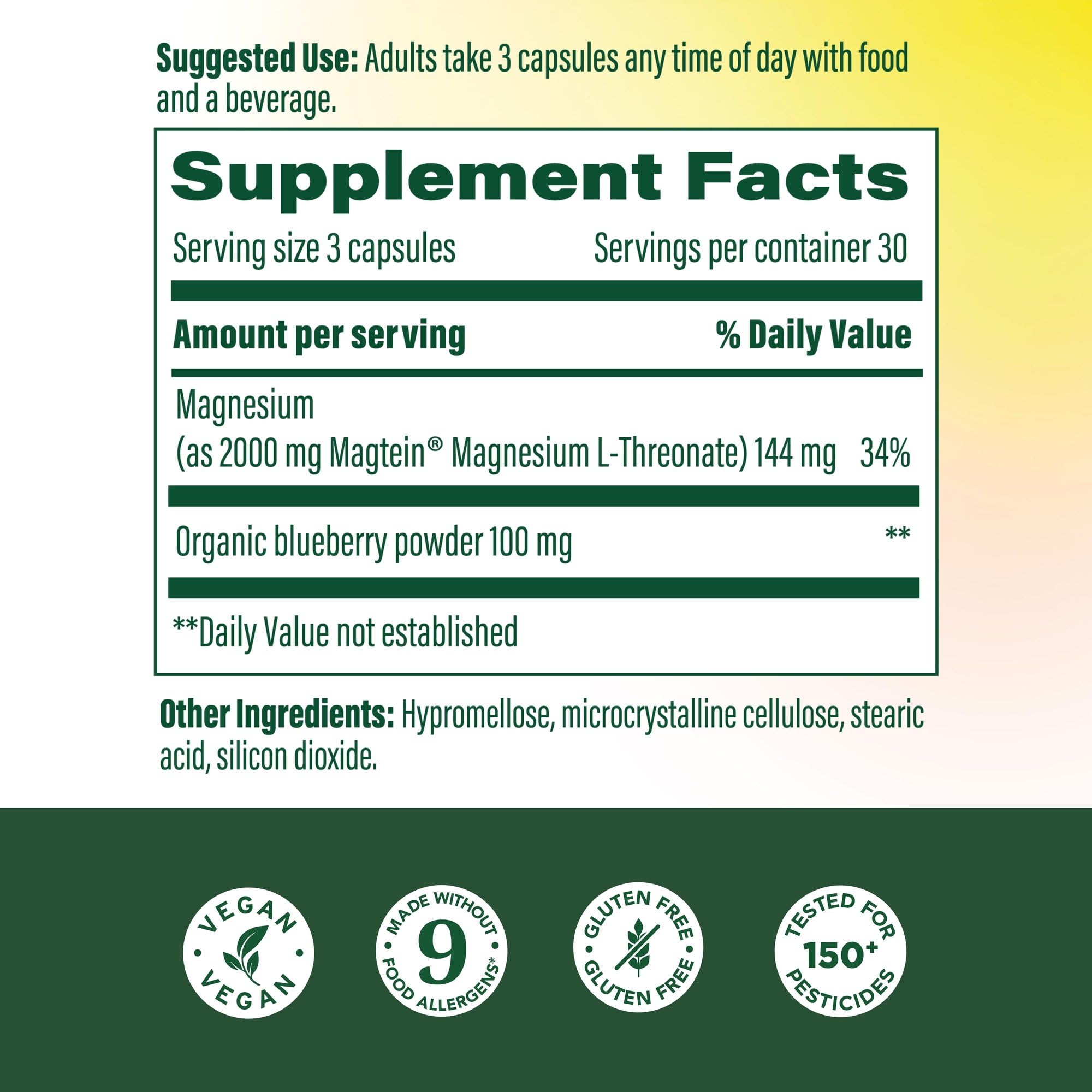 MegaFood Magtein capsules on a spoon for easy daily dosing and alertness.