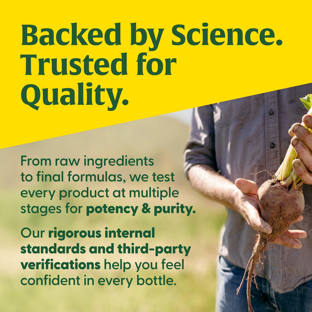 MegaFood NAC bottle beside a glass of water for daily use.