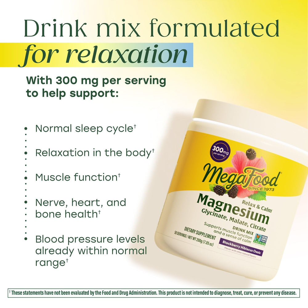 Dissolving MegaFood Relax + Calm powder in water with blackberry hibiscus flavor.