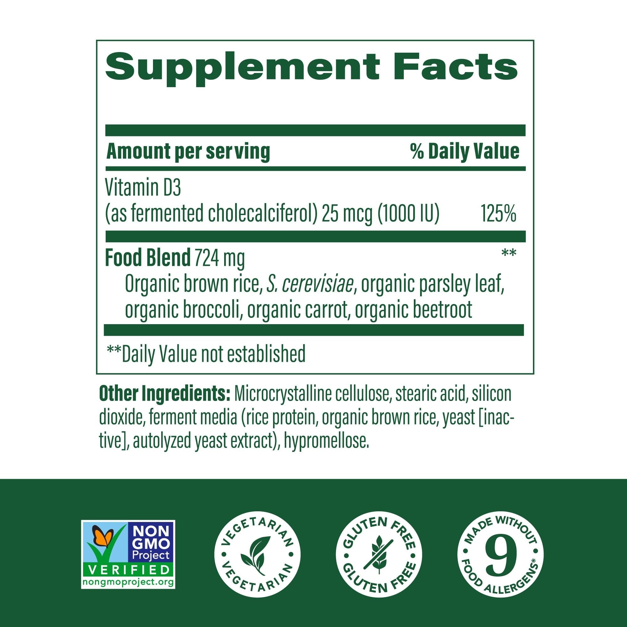 Close-up of MegaFood Vitamin D3 tablets highlighting vegetarian, non-GMO formula.