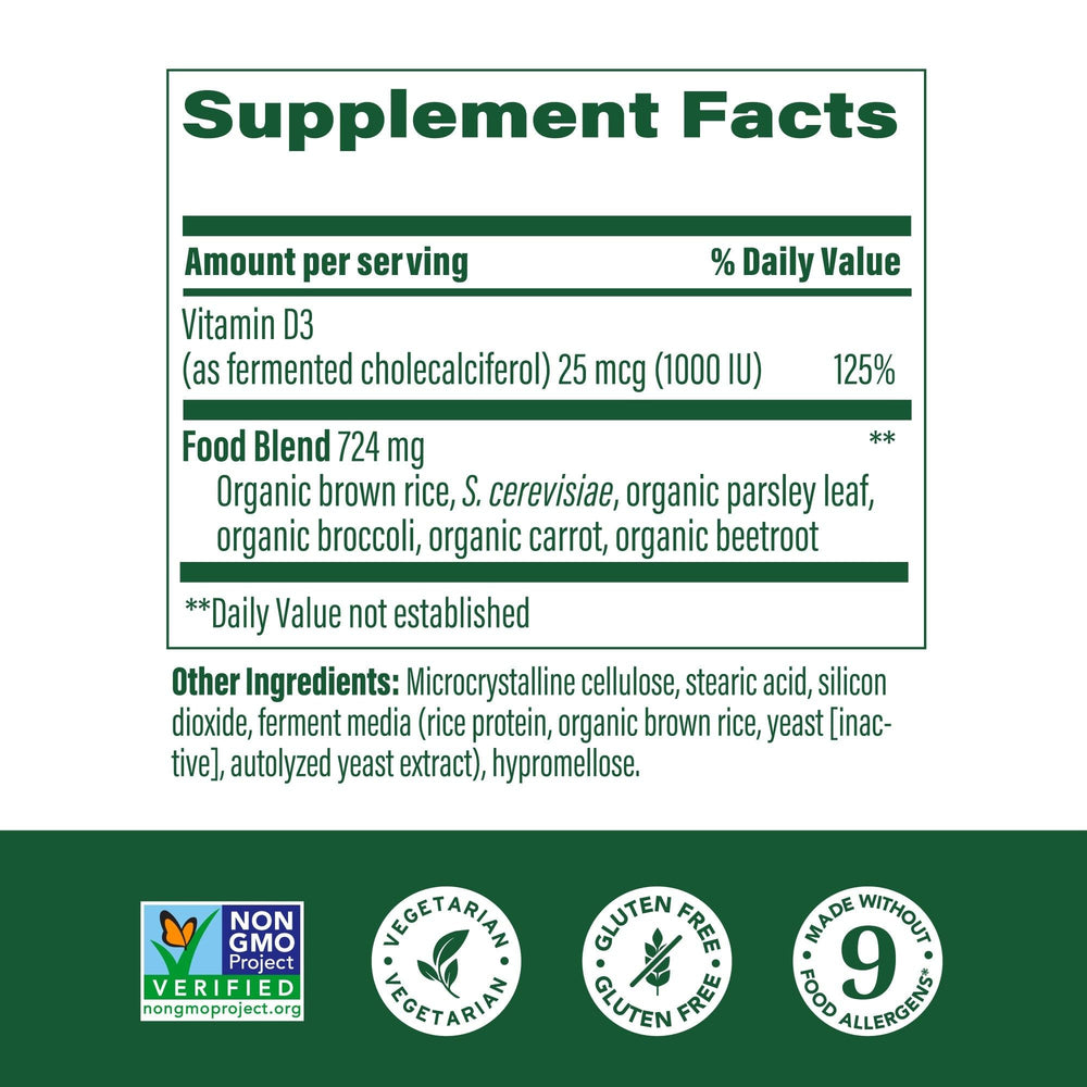 Close-up of MegaFood Vitamin D3 tablets highlighting vegetarian, non-GMO formula.