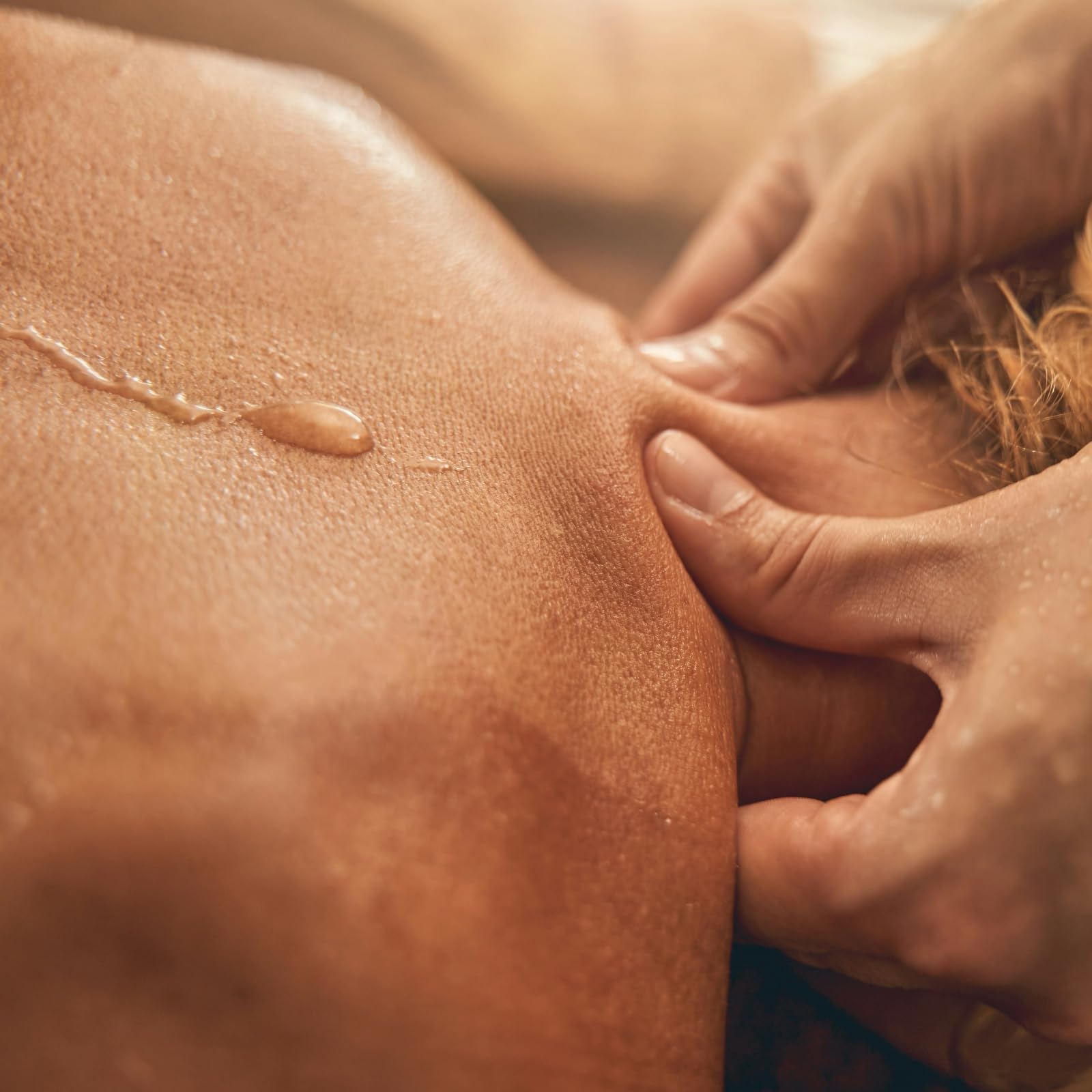 Melony melt-pool image reveals silky oil ready for skin massage.