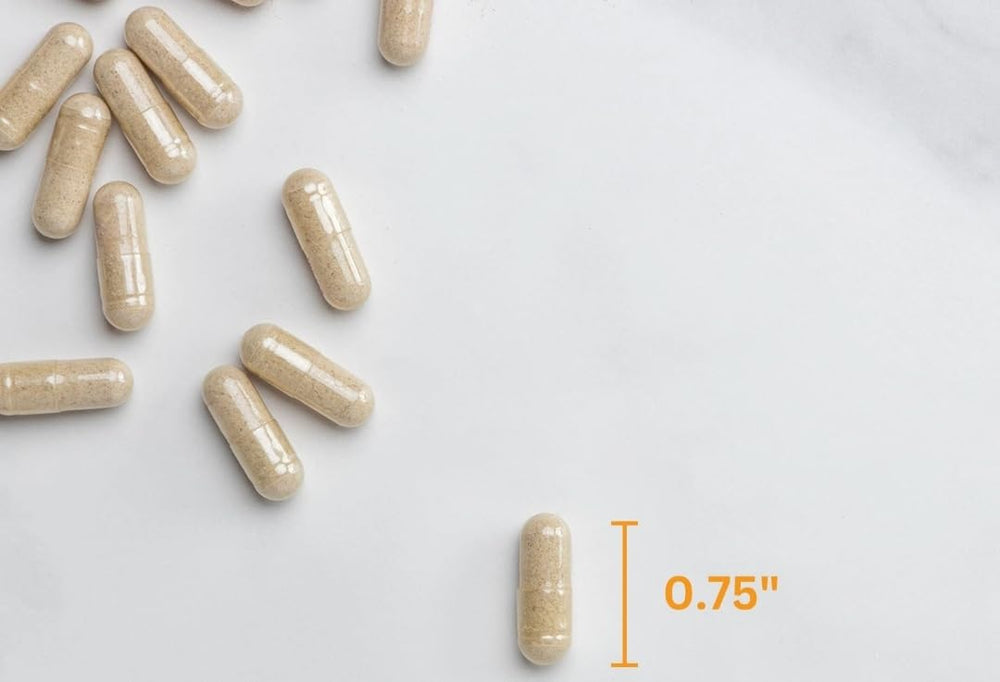 Pouring Member's Mark psyllium capsules into water for easy mixing.