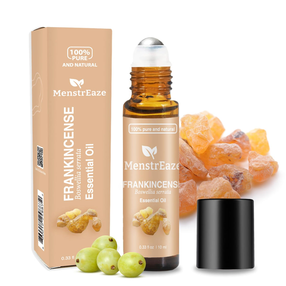 MenstrEaze frankincense-grapeseed roll-on bottle showcases soothing daytime calm.