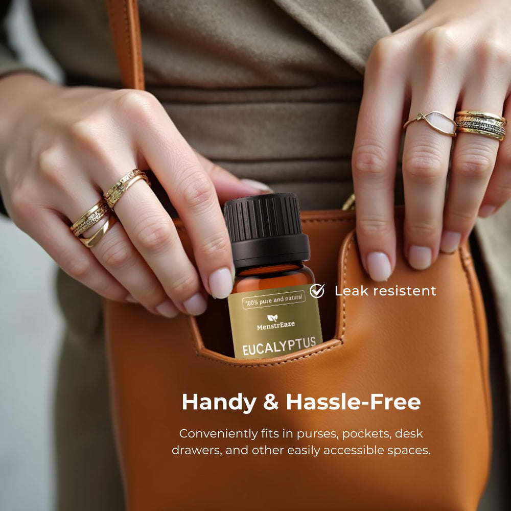 MenstrEaze eucalyptus oil travel-bottle shows convenient leak-resistant packaging for wellness on the go.