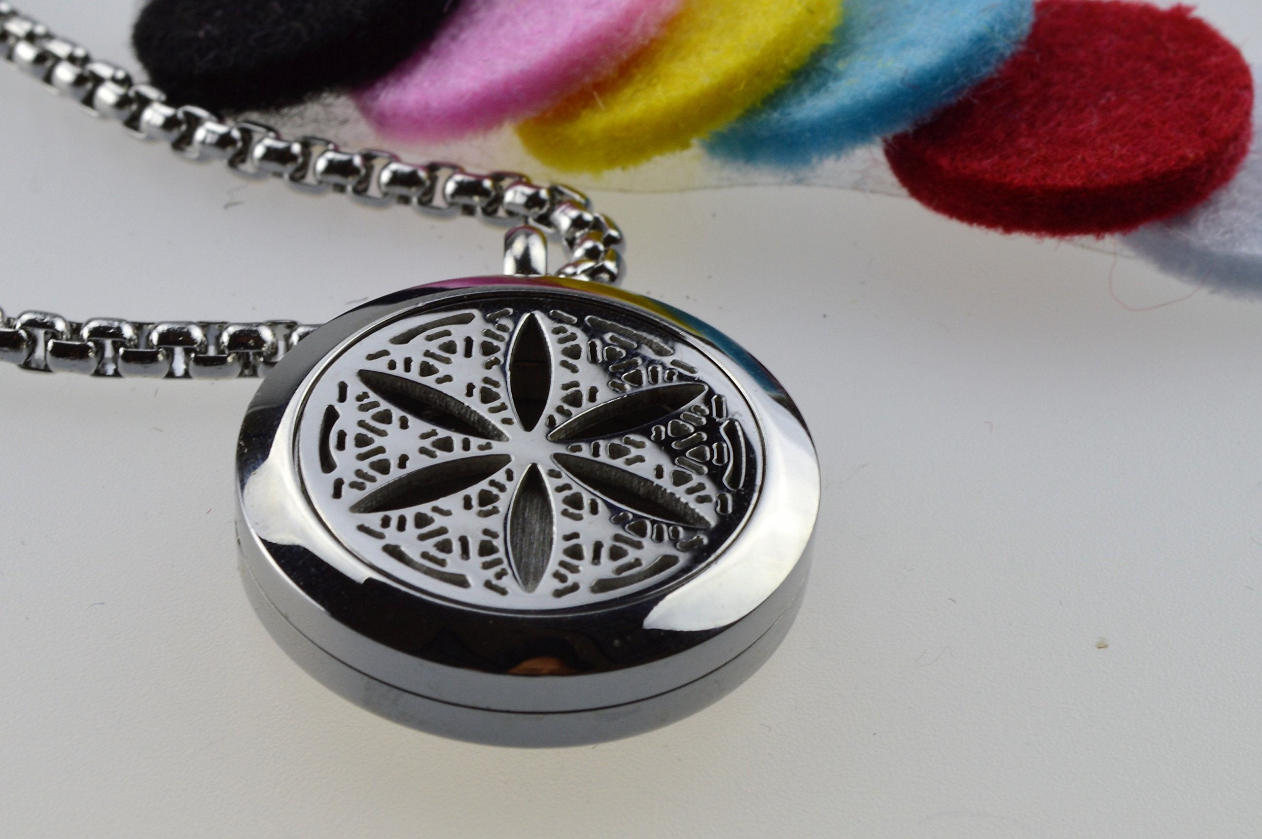 mEssentials secure clasp and back view of locket