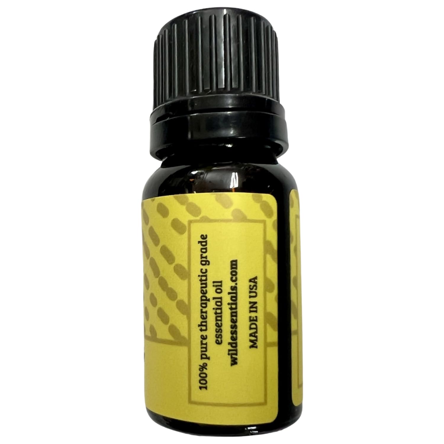 mEssentials Ylang Ylang close-up bottle highlights pure aroma.