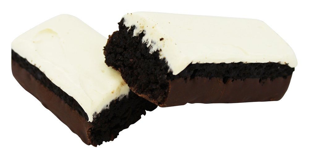 MET-Rx Colossal Cookie Crunch bar in hand for on-the-go fueling during a busy day.