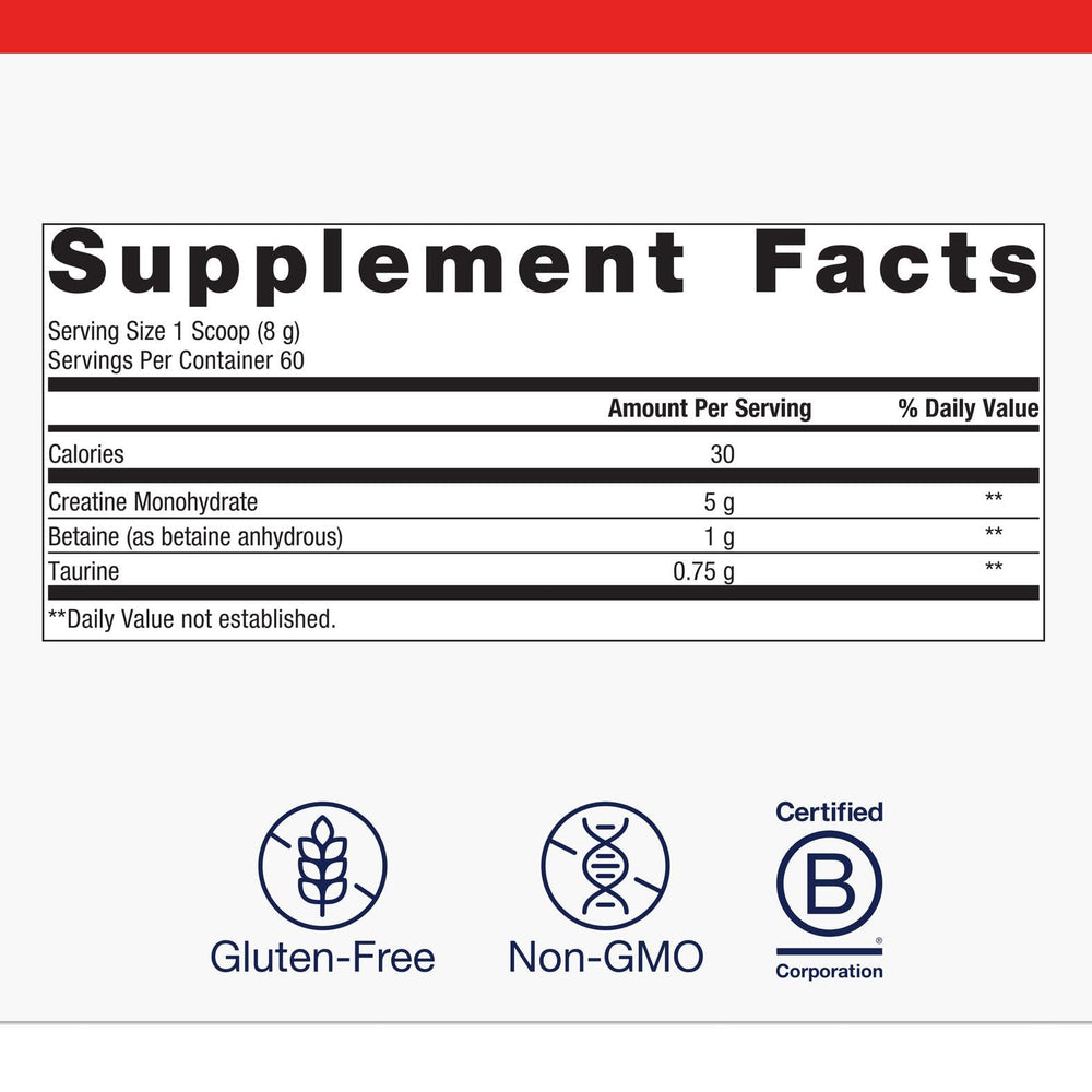 Metagenics Creatine UP scoop in glass showing easy mixing.