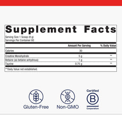 Metagenics Creatine UP scoop in glass showing easy mixing.