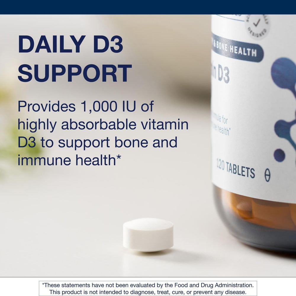 Metagenics Vitamin D3 bottle displayed on a tidy workspace surface.