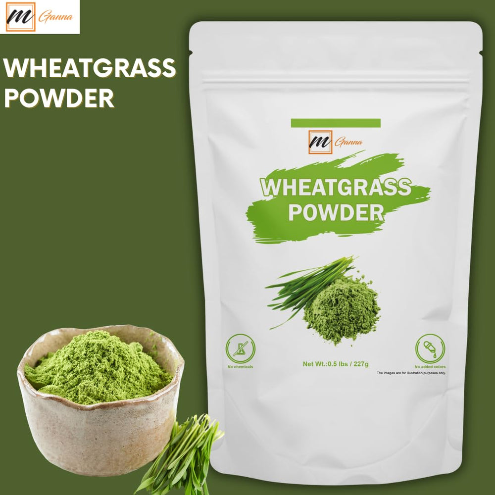 mganna Pure Wheatgrass Powder scoop in use offers an easy nutrient boost for smoothies.