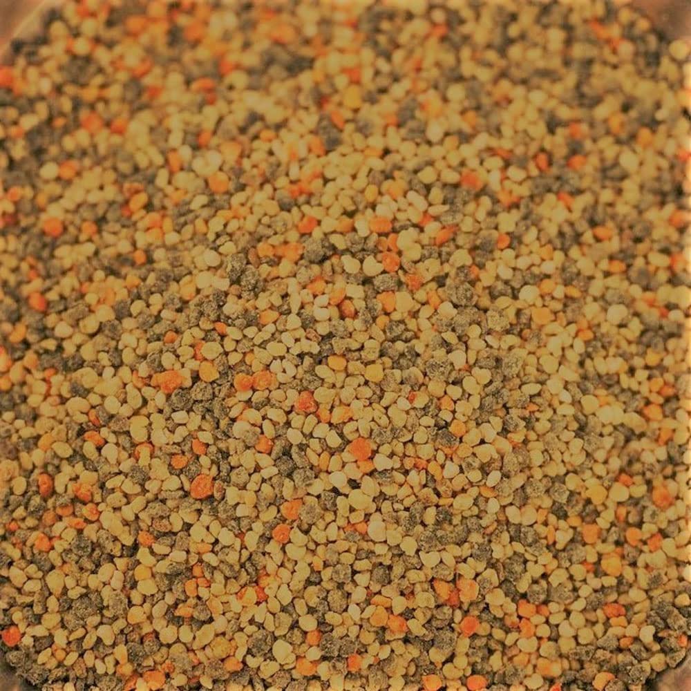 Mickelberry Gardens bee pollen granules in granola bowl, nutritious crunch.