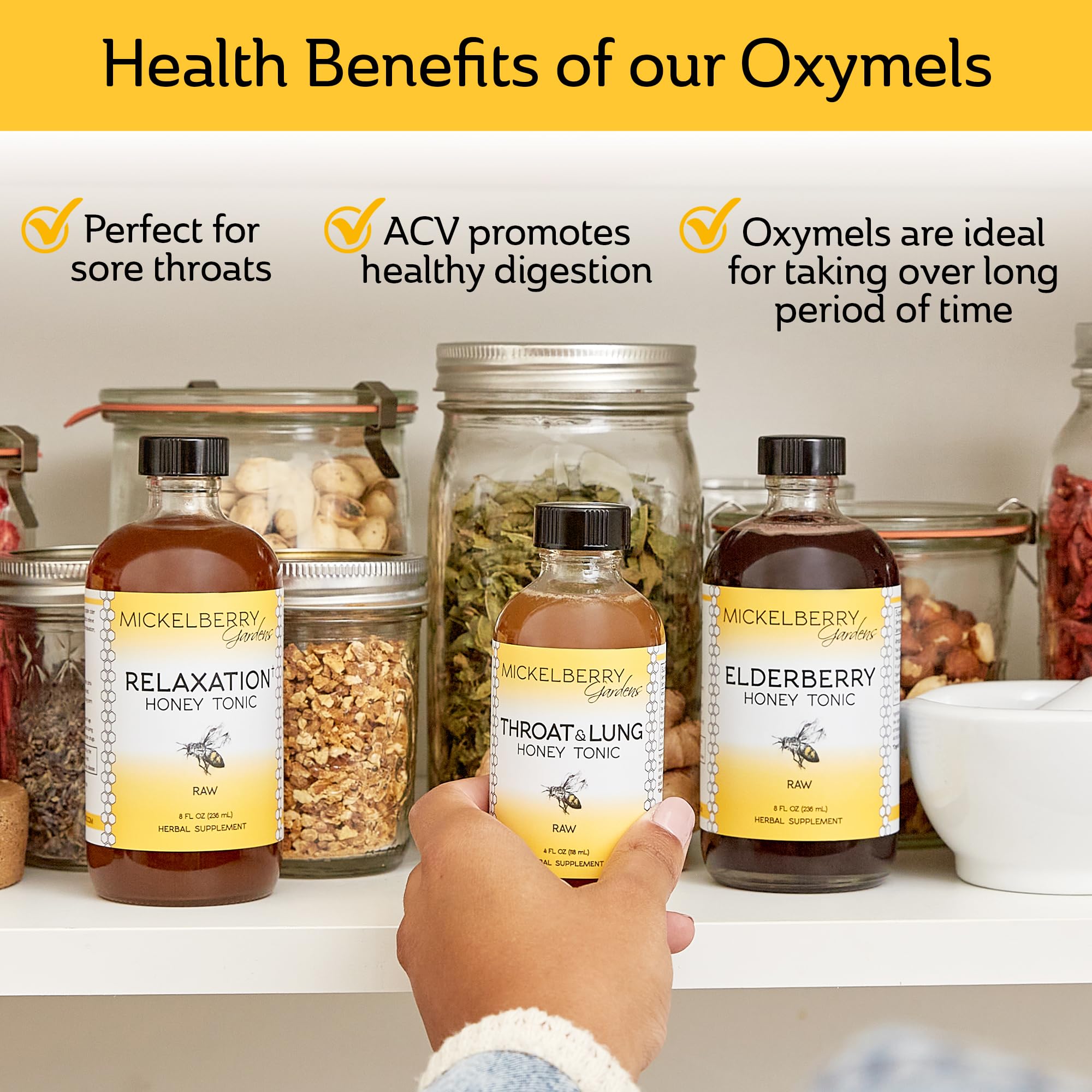 Stirring Mickelberry Gardens honey tonic into tea for a comforting wellness boost.