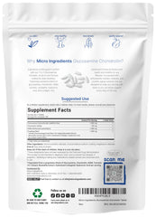 Micro Ingredients bisected tablets close-up showing smooth coating for easy swallowing.