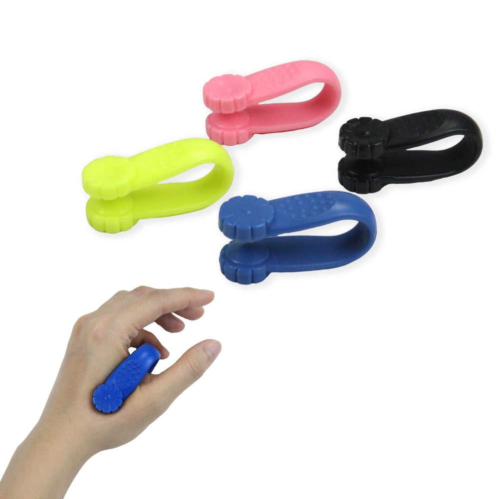 Migraine Pressure Point Clips black on hand for quick headache relief.