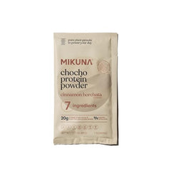 Mikuna Chocho powder scoop showing measured serving for vegan, gluten-free nutrition
