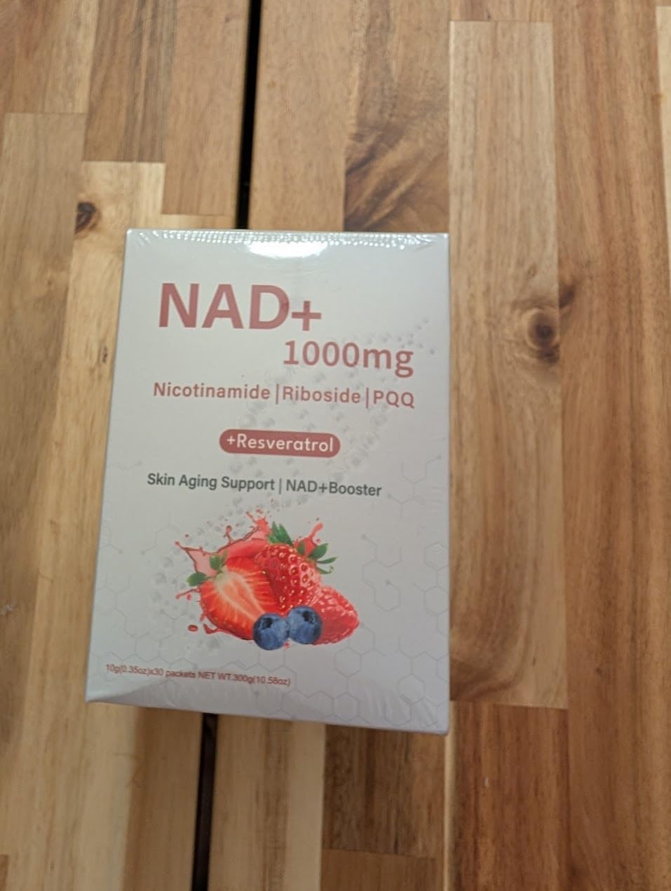 Milizhiwu NAD+ berry drink packet open, single-serve for on-the-go wellness