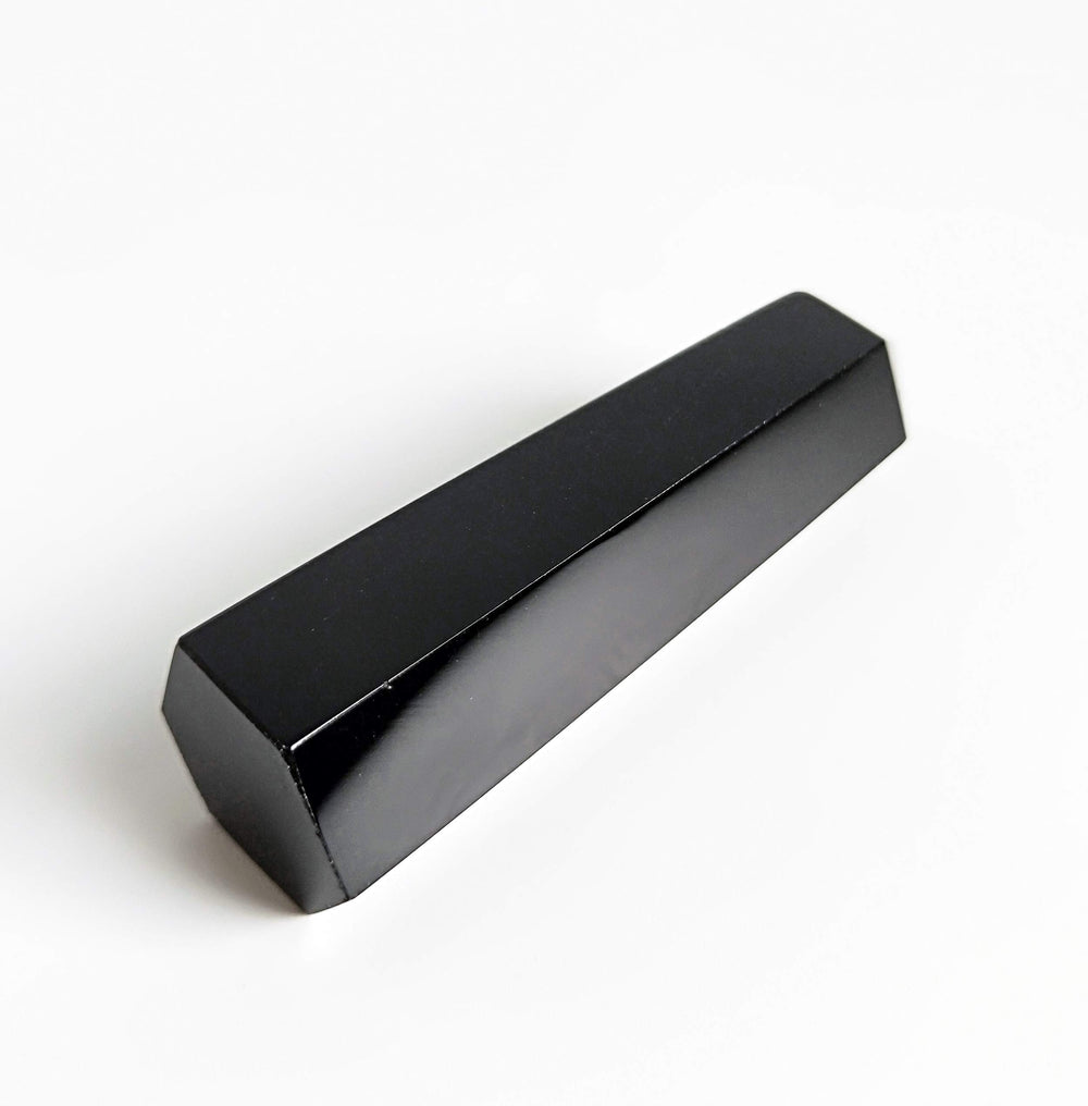 Mina Heal Black Obsidian wand on meditation setup enhancing focus and block clearing rituals