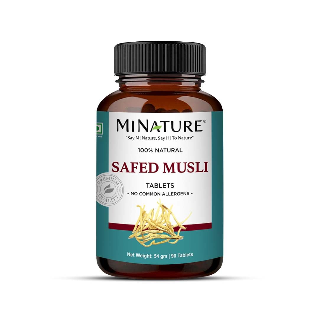 Minature Safed Musli tablets bottle on desk highlights a pure plant-based herbal supplement for daily vitality.