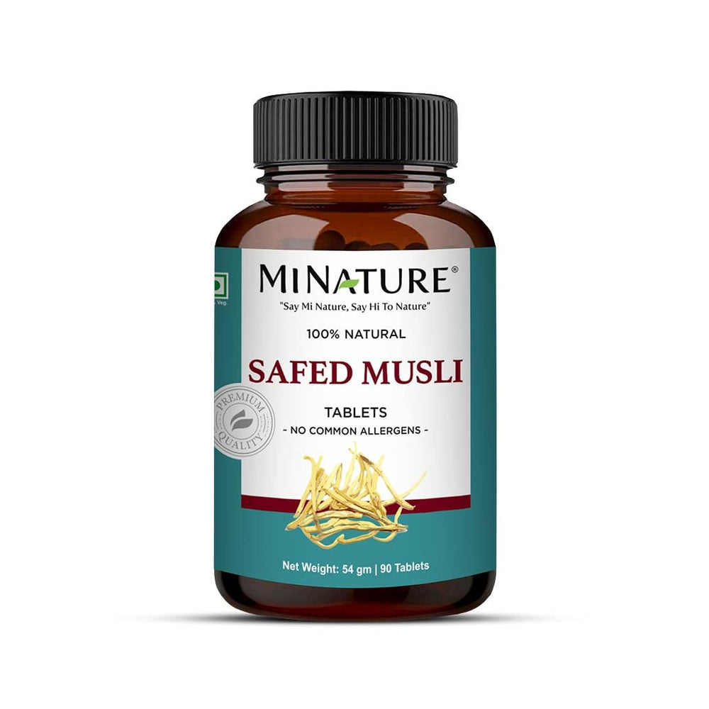 Minature Safed Musli tablets bottle on desk highlights a pure plant-based herbal supplement for daily vitality.