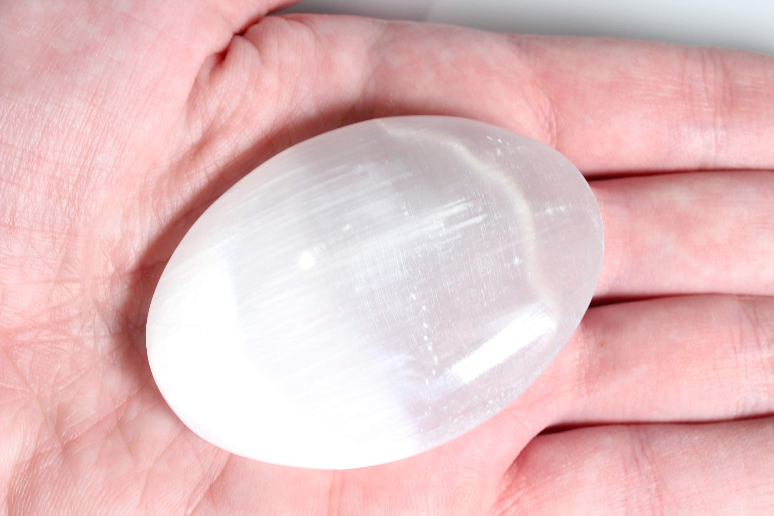 MINERALUNIVERSE White selenite crystal ready for meditation and calm.