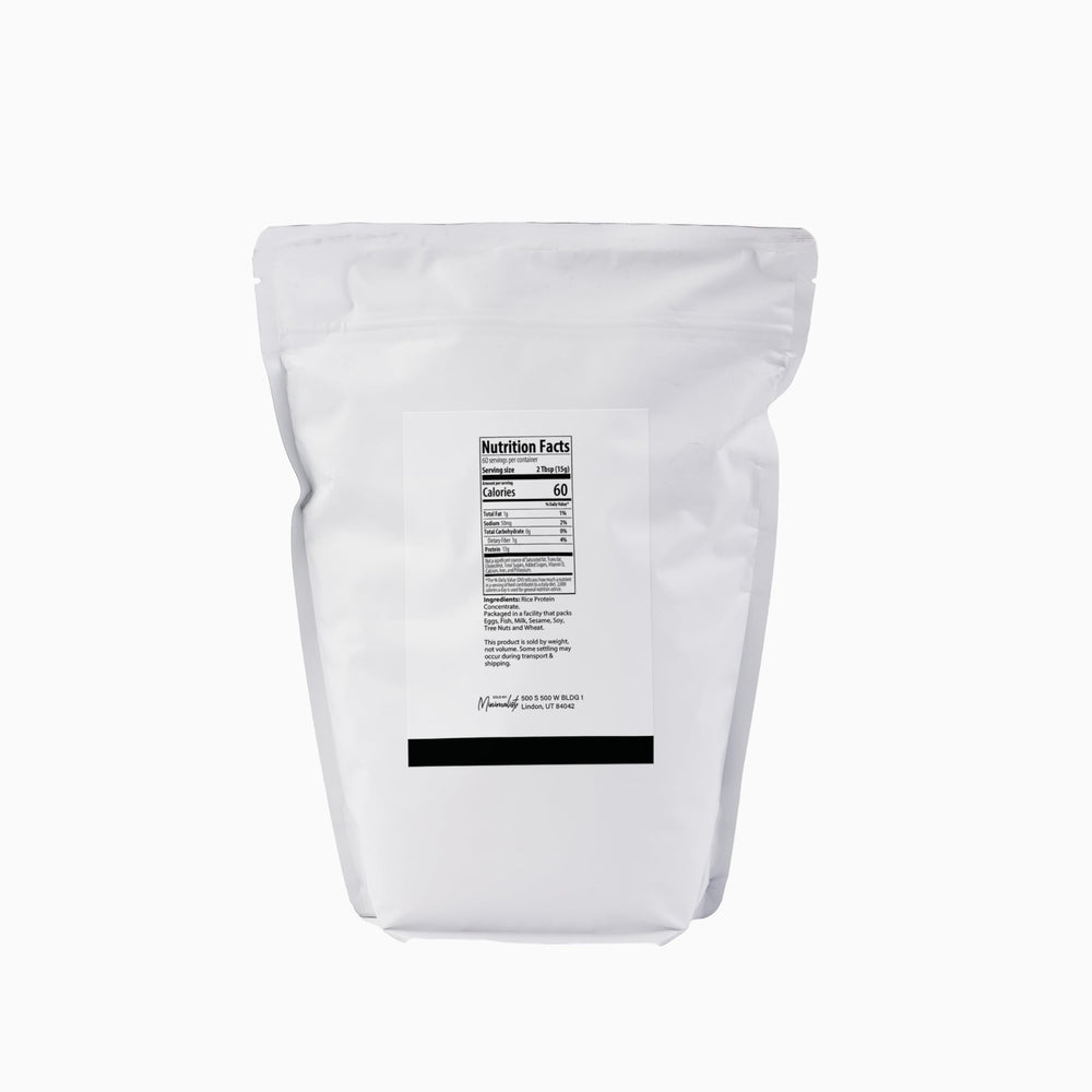 Minimalist Rice Protein bag open showing user-friendly packaging for smoothies.