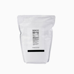 Minimalist Rice Protein bag open showing user-friendly packaging for smoothies.