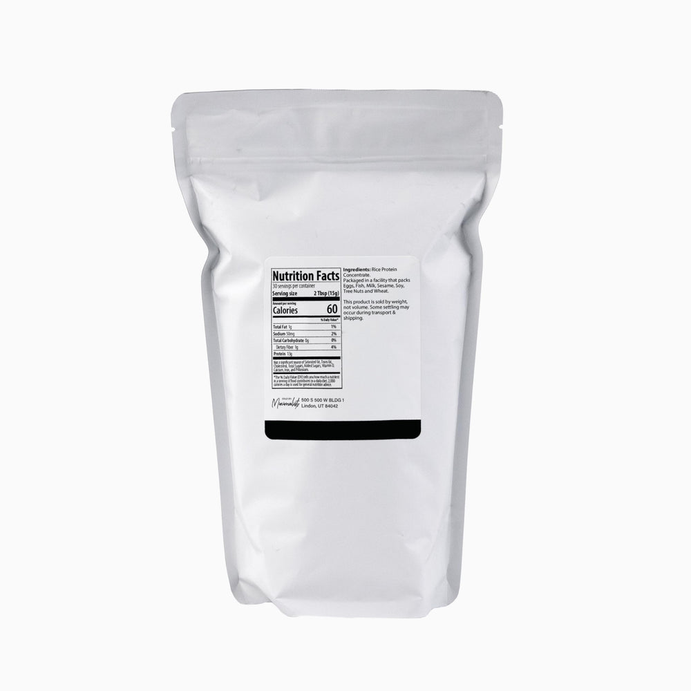 Minimalist Rice Protein being poured into a shaker for easy smoothies