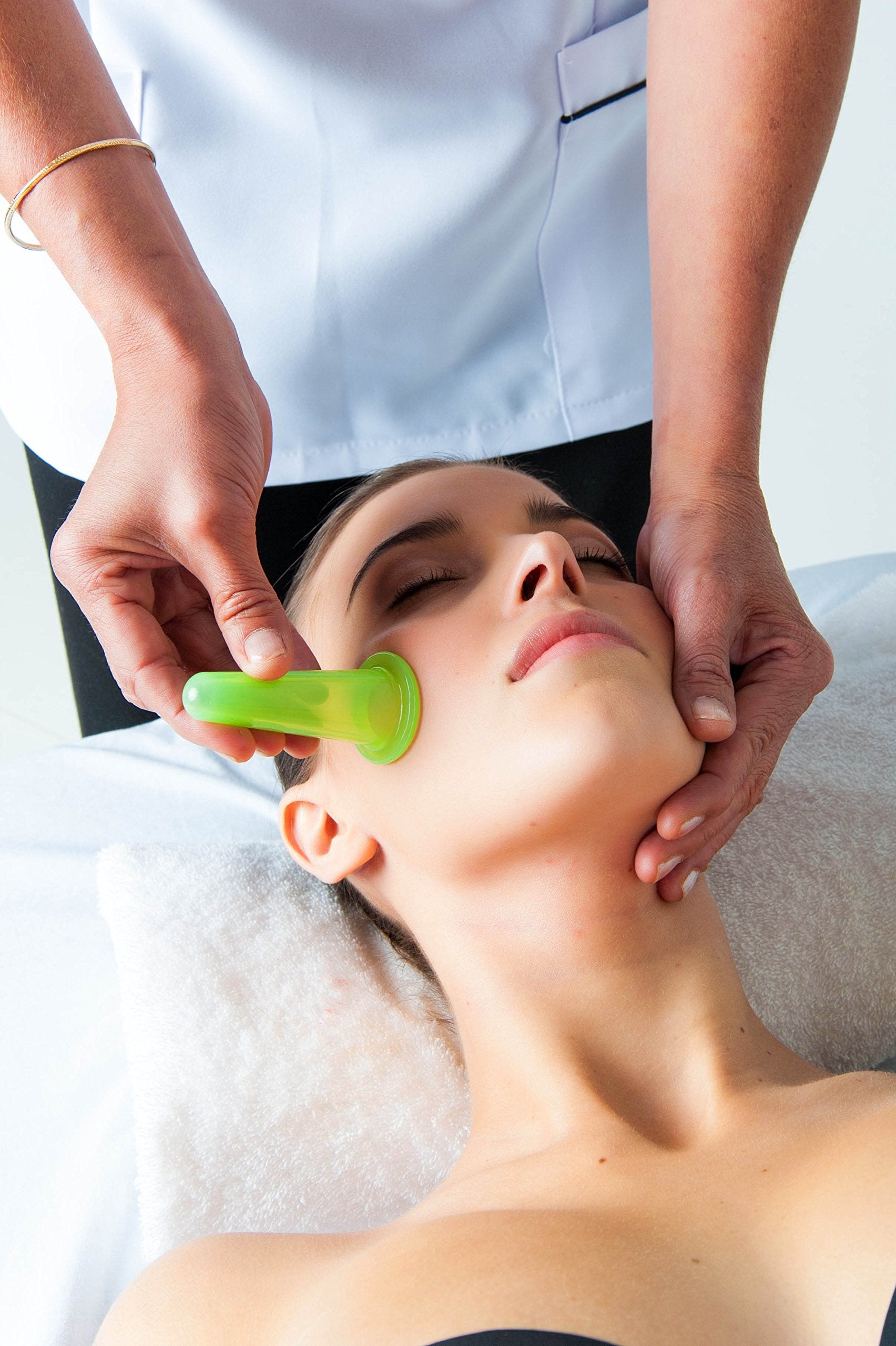 Mira Dynamics face cupping massage setup for quick 5-minute skincare sessions.