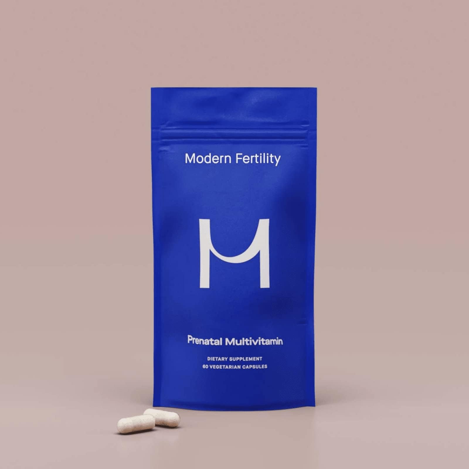 Modern Fertility Prenatal Multivitamin bottle being poured for easy daily intake
