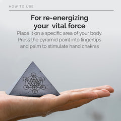 Modern ŌM Clear Quartz pyramid top view showing master healer symbol