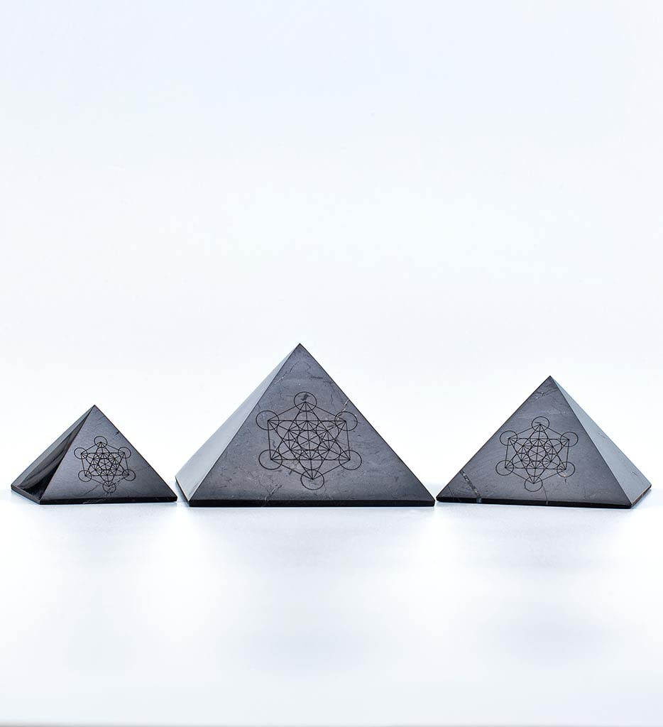 Modern ŌM meditation pyramid set in use for focused energy