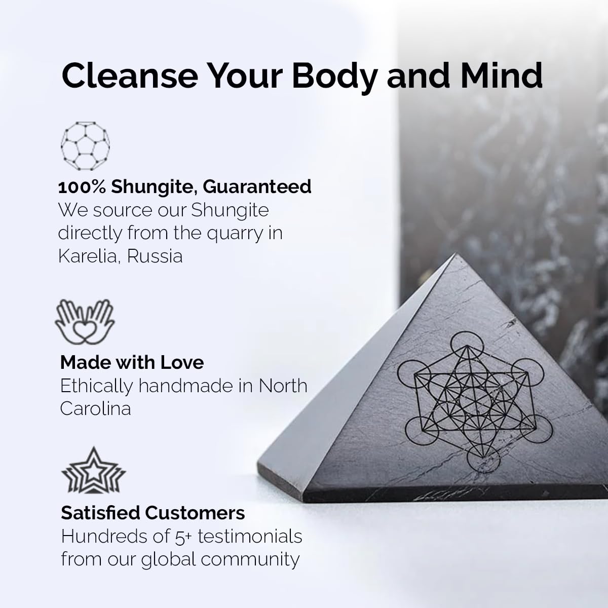 Modern ŌM Shungite pyramid Metatrons Cube side view highlighting sacred geometry