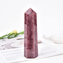 MOGEMT altar grid with strawberry quartz obelisk for sacred energy.