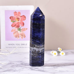 MOGEMT blue sodalite crystal tower close-up facets showing natural texture.